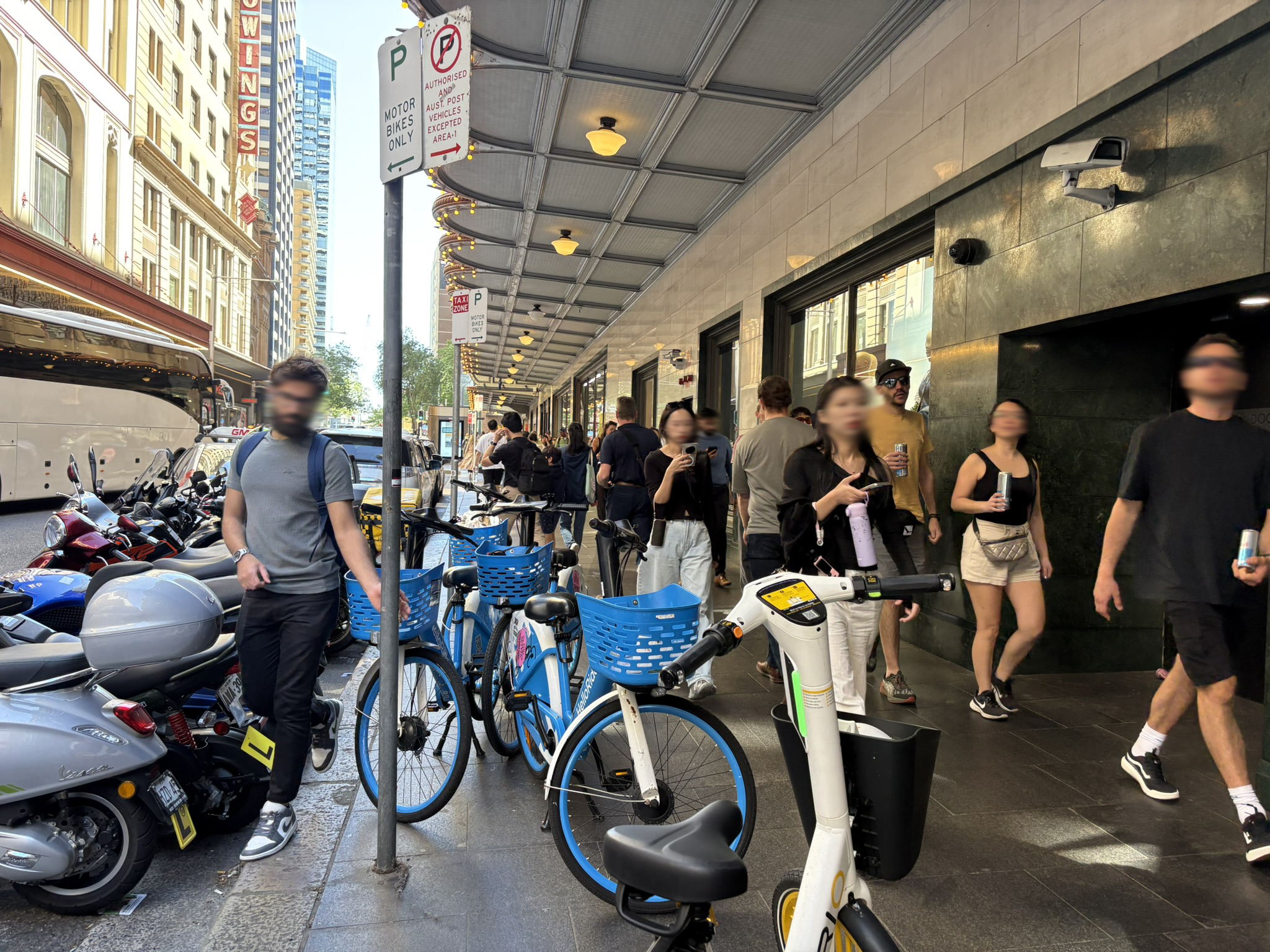 A noisy crowded footpath