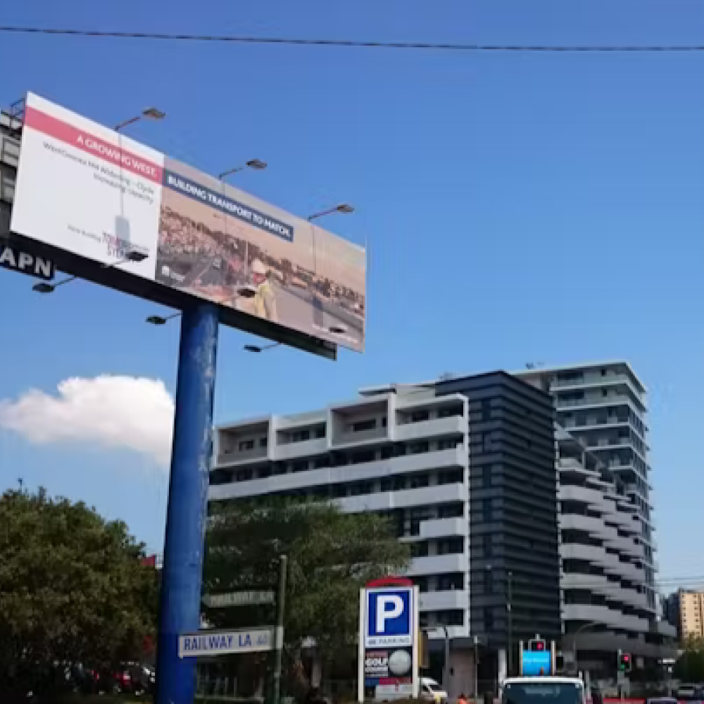 Apartment with a bilboard in front of it