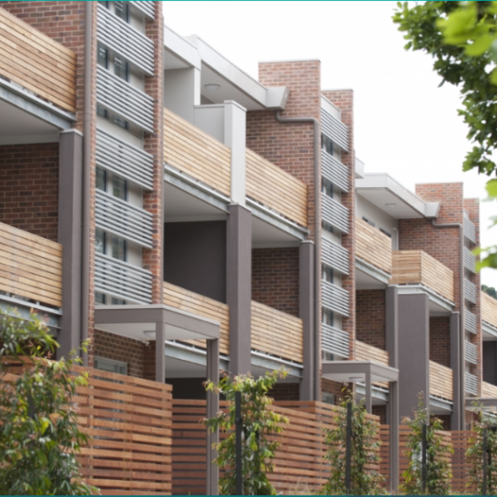 Three story apartment buildings