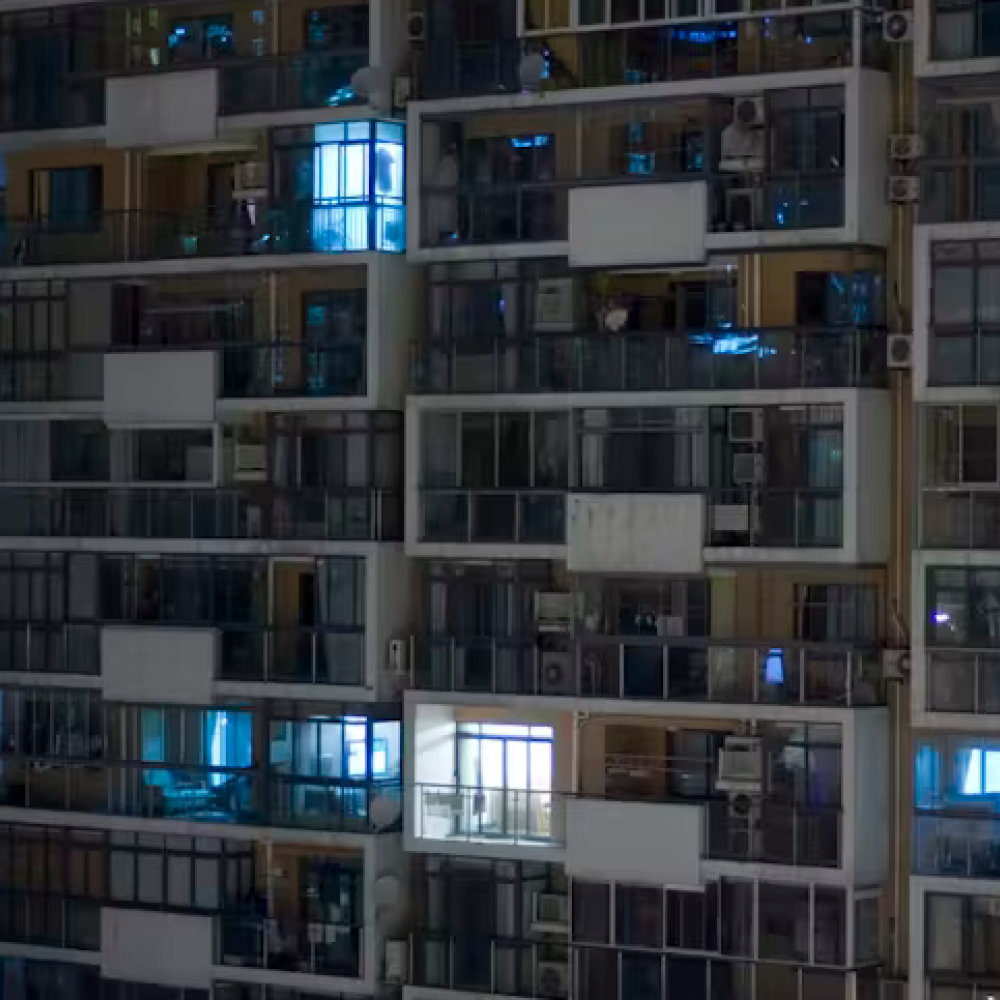 Apartments lit up at night