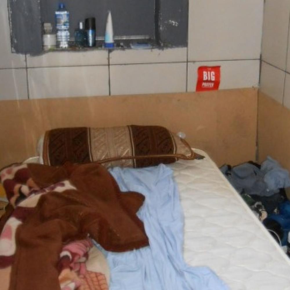 Dirty bed in a bathroom
