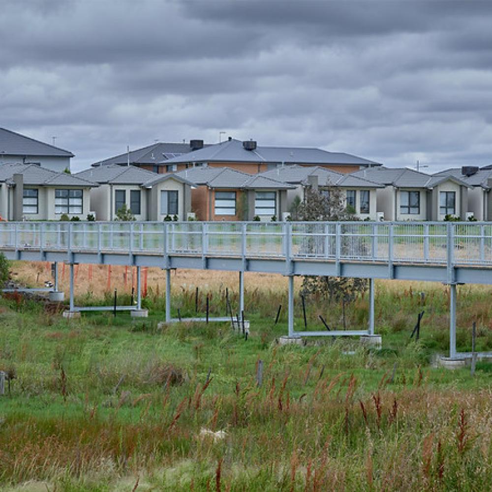 Steel bridge over grass